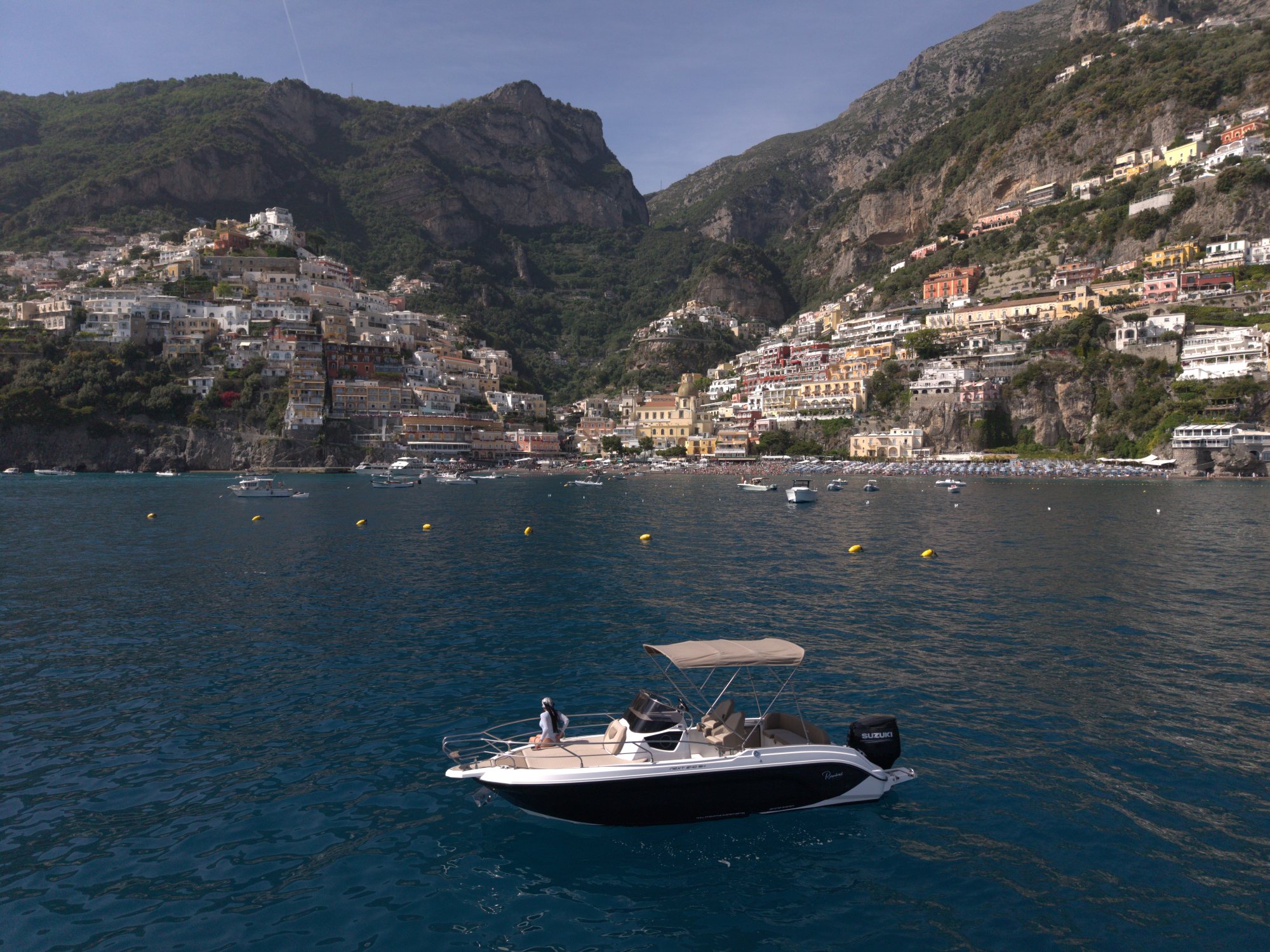 Amalfi Coast Tour — aerial view of the boat off Positano