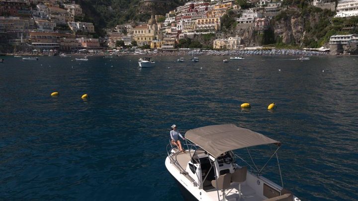 A hidden cove on the Amalfi Coast seen from a boat