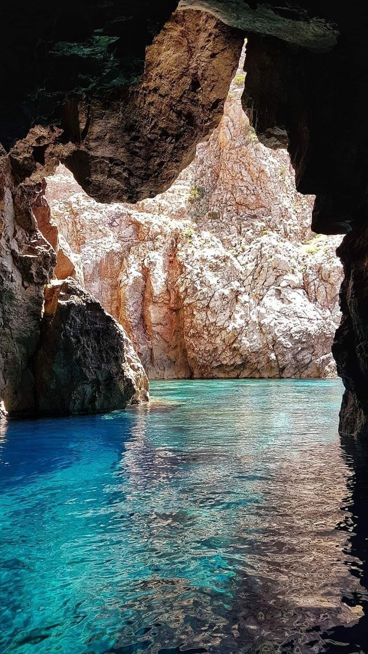 Turquoise water inside a hidden sea cave