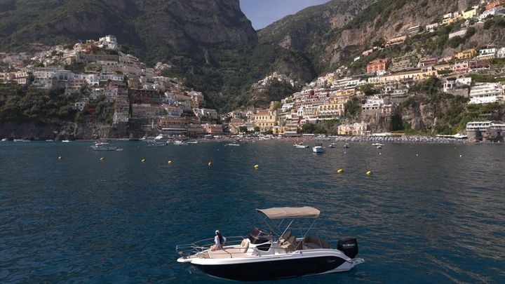 Aerial view of a boat off Positano on the Amalfi Coast