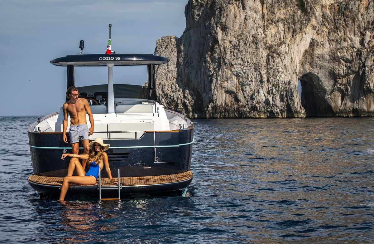 The Apreamare Gozzo 35 anchored beneath the Faraglioni of Capri