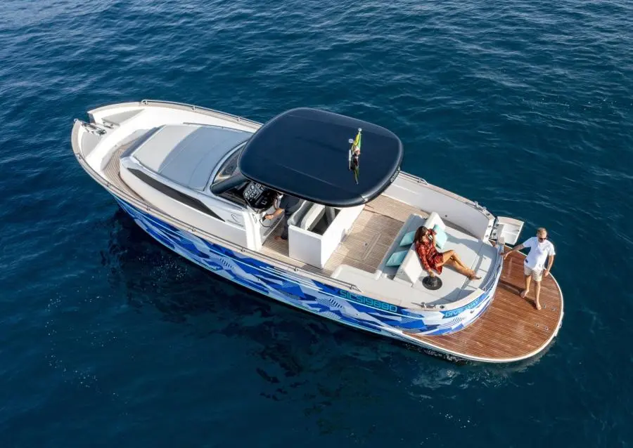 Aerial view of the Apreamare Gozzo 35 with guests relaxing on the aft deck