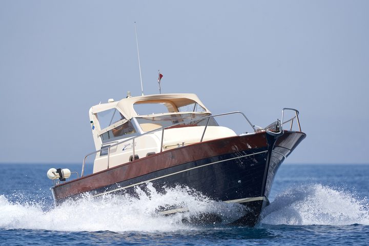 The Gozzo 26 cruising at speed off the coast