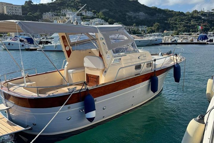 The Gozzo 26 moored at the marina, ready for the day's charter