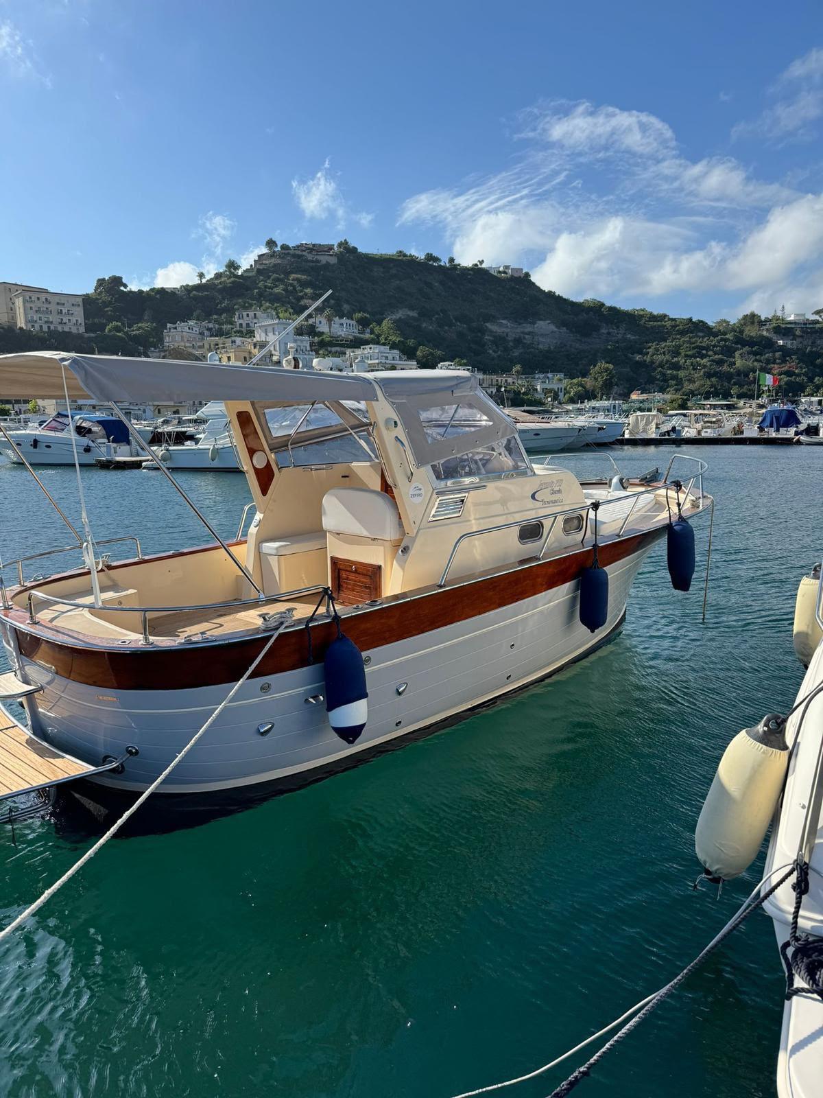 The Gozzo 26 moored at the marina, ready for the day's charter