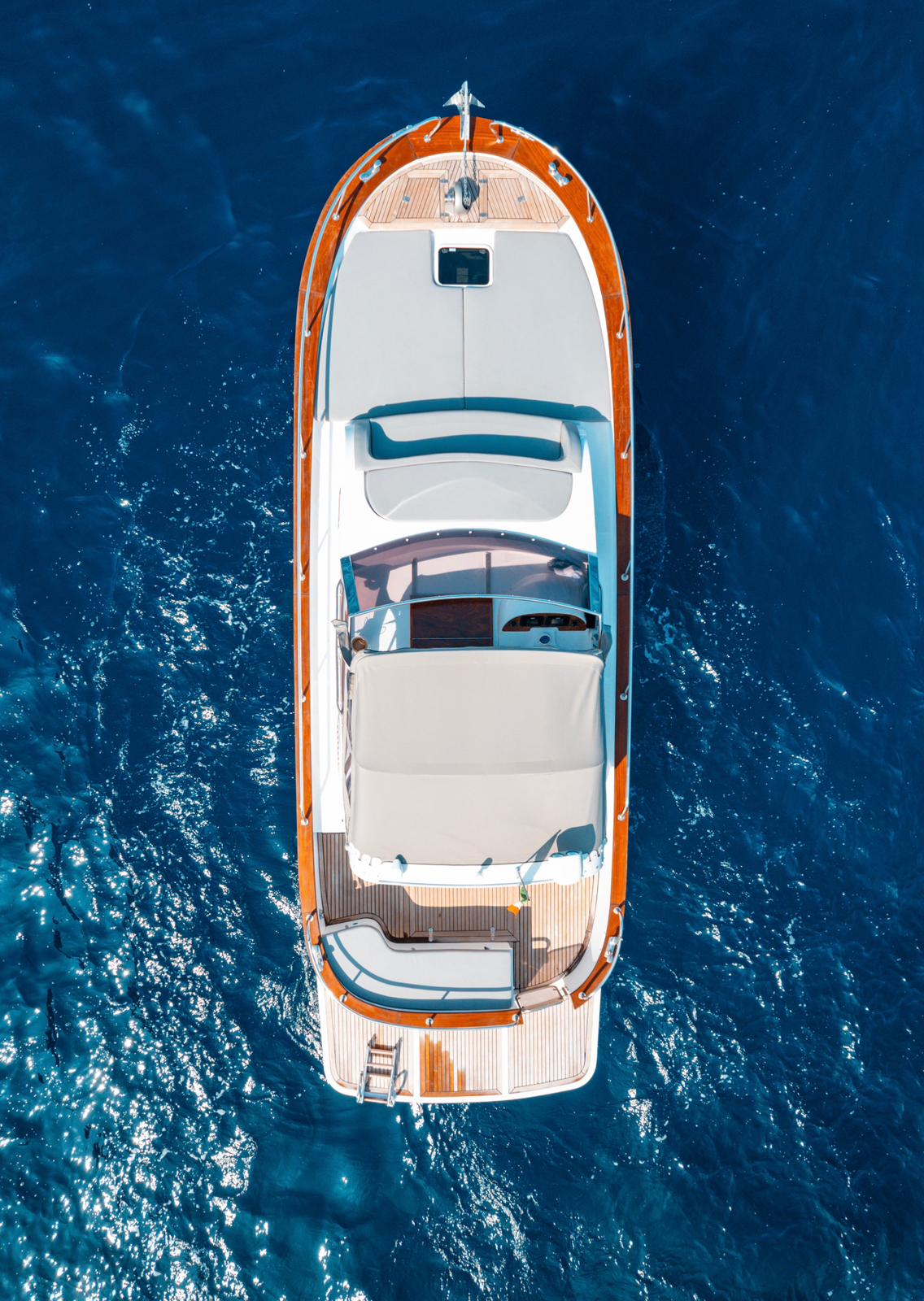 Overhead aerial view of the Gozzo 30 on the deep blue sea