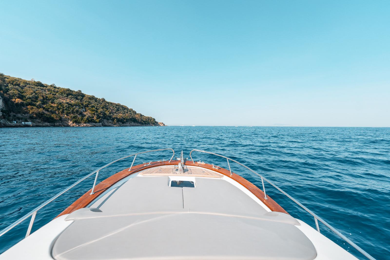 The bow sunpad of the Gozzo 30 open to the sea