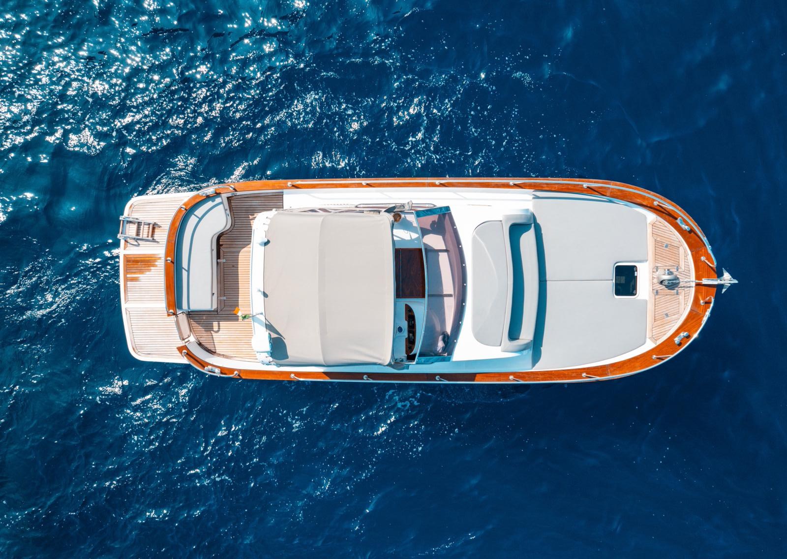 Overhead aerial view of the Gozzo 30 on the deep blue sea off Sorrento