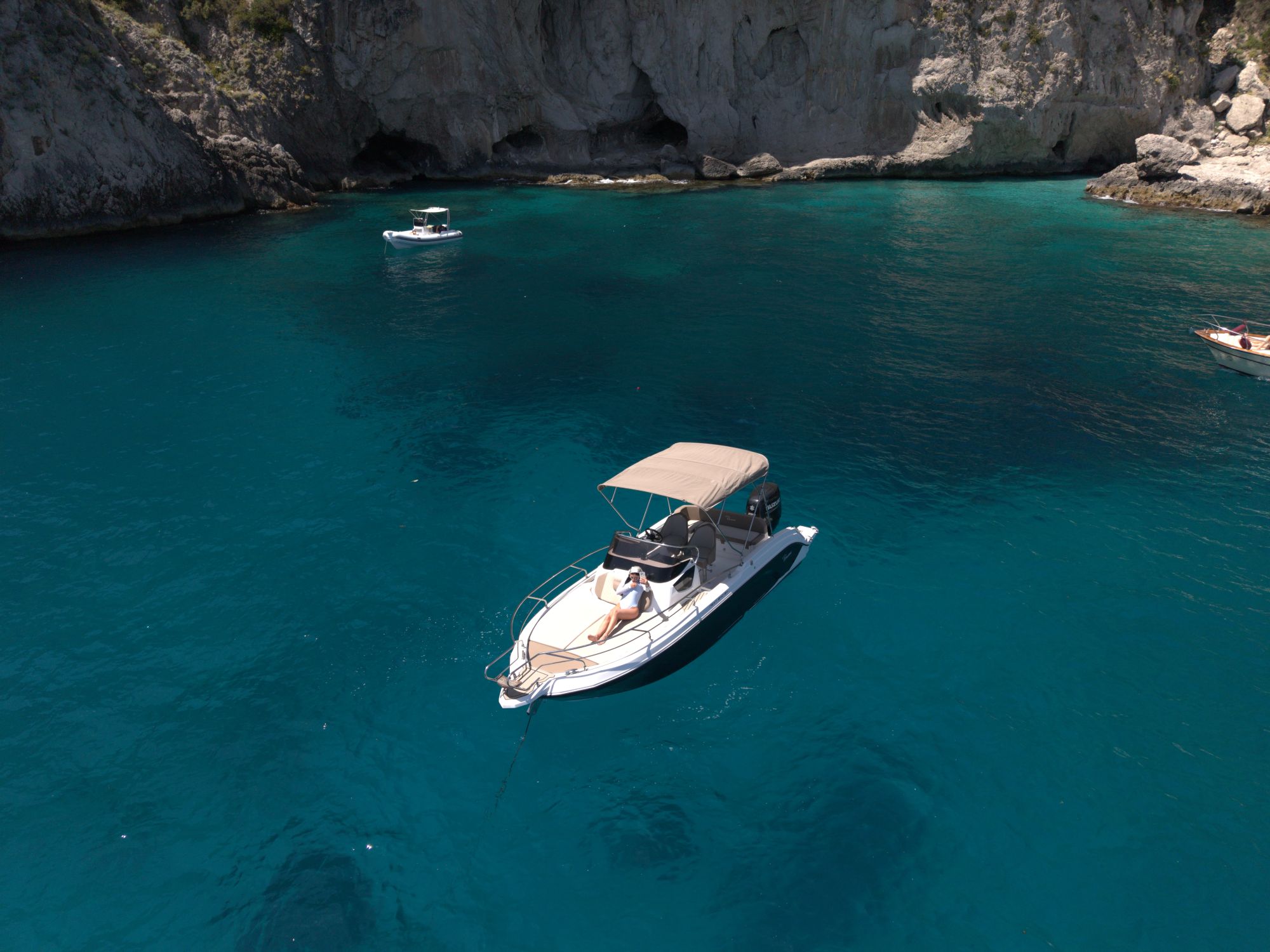 Aerial view of the boat on calm water